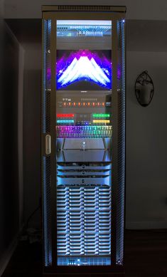 a computer that is sitting inside of a glass case