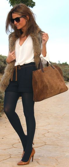 Wear dress shorts over black tights and layer with a fur vest to make your shorts work for fall. Fur Vest Outfits, Vest Outfit, Winter Skirt Outfit, Winter Skirt, Vest Outfits, Looks Chic, Black Tights