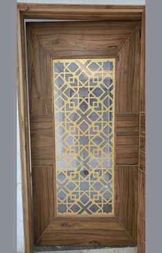 a wooden door with an intricate design on it