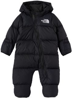 Long sleeve down-filled nylon ripstop hooded snowsuit in black. Logo embroidered in white at chest and back. · Offset zip closure at front · Foldover mittens at booties · Technical satin lining · Machine wash Supplier color: Black The North Face Kids Size: child's height 0-3M : 22-25 / 55.9-63.5 cm 3-6M: 25-28 / 63.5-71.1 cm 6-12M: 29-31 / 73.7-78.7 cm 12-18M: 31-33 / 78.7-83.8 cm 18-24M: 33-35 / 83.8-88.9 cm Fill 1: 85% down, 15% waterfowl feathers. North Face Kids, Baby Black, Baby Fits, Black Down, Black North Face, Snow Suit, Logo Embroidered, Canada Goose Jackets, Stand Collar