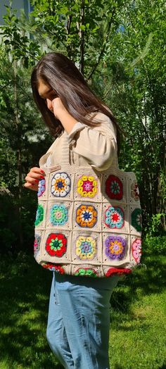 I'm crocheting grandma's knit bags for you. This wonderful floral daisy crochet bag is the perfect accessory for your summer and winter outfit. Summer is so close and the sun is shining everywhere, it's time for summer fashion :) -This awesome crochet bag is the perfect accessory for your summer and winter outfit. - Soft and bright colors in cute granny square. -Crochet bag has enough space for all your belongings :) -Fully handmade crochet after my own design. - The crochet bag is a great gift Hand Knitted Rectangular Crochet Bag For Crafting, Beige Granny Square Crochet Tote Bag, Multicolor Crochet Yarn Bag, Rectangular Knitted Bag For Everyday Use, Everyday Rectangular Knitted Bag, Bohemian Beige Crochet Bag With Granny Square, Everyday Multicolor Crochet Bag With Granny Square, Bohemian Granny Square Crochet Bag For Crafting, Beige Rectangular Crochet Bag With Granny Square