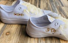 Embroidered Converse Getting Married?  What a great idea. This listing is for Mrs on one shoe last name on other shoe. Also they will have date on the outside of the shoe and I Do on the inside of the shoe  !  Ribbon laces, sheer or satin white available.  Other colors possible please message me your requests!**This listing does not come with pearls. That is additional charge **I will use red hearts in the date unless you specify something else.Other options available in my shop!!Wear these at y White Low-top Bridal Sneakers, Custom White Sneakers With Round Toe For Anniversary, White Custom Sneakers With Round Toe For Anniversary, White Low-top Wedding Shoes, Groom Shoes Wedding, Embroidered Sneakers, Embroidered Converse, Low Top Converse, Ribbon Laces