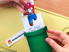 someone is making a paper mario birthday card