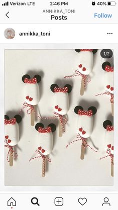 some kind of stick with hearts on it and the word minnie mouse is in front of them