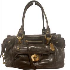 Coach Hampton Lindsay Satchel This Beautiful Vintage Coach Espresso Satchel Has Been Stored In The Dust Bag. 100% Authentic With Tags Still Attached. A Front Flap With Imposing Brass Turn Lock Conceals Two Smaller Front Pockets. The Left Pocket Has A Zipper To It, Which Was Probably Conceived As A Coin Pocket. Another Zippered Pocket In Front Can Be Found In Between The Brass Eyelets. Brass Hardware All Over, With Impressive Snap Ring And Eyelets. The Back Of The Bag Has An Outer Zippered Pocket Access Granted, Angelic Beauty, Magic Bag, Image Swag, Coach Satchel, Snap Ring, Leather Saddle Bags, Pretty Bags, Vintage Coach