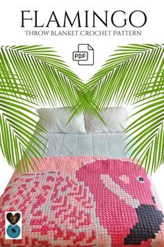 a bed with pink and green bedspread next to a palm tree on the cover