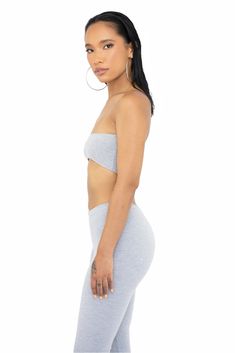 High Quality Bandeau with a front dip Available in black and heather gray Made in USA 95% Cotton 5% Spandex Machine wash Cold water Do not tumble dry Line dry Sporty Stretch Tube Top For Sports, Fitted Gray Crop Top For Yoga, Fitted Gray Crop Top For Workout, Gray Fitted Sporty Crop Top, Gray Sporty Crop Top, Gray Stretch Crop Top For Yoga, Stretch Gray Crop Top For Yoga, Gray Seamless Athleisure Crop Top, Gray Seamless Crop Top For Workout