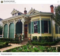 a yellow house with green shutters on the front and side windows is featured in an instagram