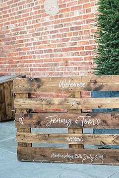 a couple of wooden crates sitting on top of a sidewalk