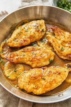 the recipe for lemon butter chicken cutlets is shown in a pan with text overlay