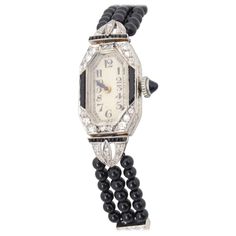 Art Deco diamond and onyx watch head set in newer triple-strand band of onyx beads with diamond spacers. Watch head is platinum. Spacers and clasp are 14K white gold. Hand engraved on back of head "Aimée." Lady Watch, Art Deco Watch, Art Deco Lady, Head Set, Watches Women Fashion, Art Deco Diamond, Women Wrist Watch, Art Deco Jewelry, Diamond Watch