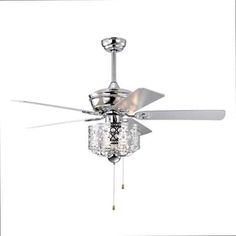 a ceiling fan with three crystal chandeliers hanging from it's blades