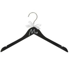 a black hanger with the word mr and mrs on it