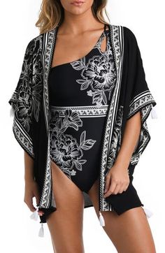 This lightweight cover-up is highlighted by a border print and fringed tassels for a style that's ready for a sunny getaway. Open front Elbow-length sleeves 100% viscose Hand wash, line dry Imported Spring Pool Cover-up With Tassels, Spring Beach Cover-up Swimwear With Tassels, Black Tassel Cover-up For Beach Season, Fragrance Cologne, Rollerball Perfume, Face Mist, Curly Hair Care, Border Print, Fragrance Design