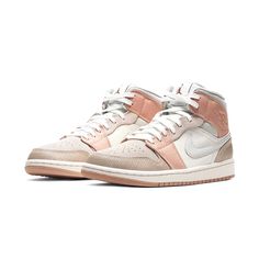 This premium offering of the mid-top Air Jordan 1 comes dressed in rich, warm hues featuring a mix of materials including canvas, suede, and tumbled leathers. Its debossed tongue tag comes with a Metallic Bronze Jumpman, while having Deep Red insoles. Completing the design is a special leather ?MLN? hangtag in the same textured finish [...] Air Jordan 1 Mid Milan, Jordan 1 Milan, Unisex Shoes Sneakers, Heritage Fashion, Jordan 1 Low, Unisex Shoes, Air Jordan 1 Mid, Custom Sneakers