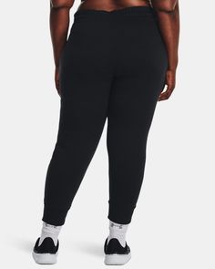 Ultra-soft cotton-blend fleece with brushed inside for extra warmth|Encased elastic waistband with external drawcord|Open hand pockets Black Casual Under Armour Sweatpants, Under Armour Black Sweatpants With Pockets, Black Fleece Bottoms With Elastic Waistband, Black Fleece Bottoms With Ribbed Waistband, Under Armour Cotton Sweatpants With Pockets, Under Armour Black Cotton Bottoms, Under Armour Casual Jogging Bottoms, Under Armour Casual Loungewear Pants, Casual Under Armour Pants For Loungewear