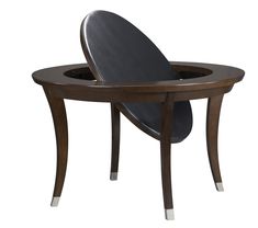 a wooden table with a black chair on it's back and an oval shaped top