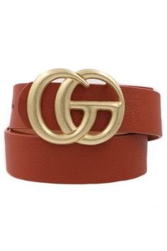 A Simple Twist on a classic Gucci style belt. Same look and feel, but without the hefty price tag. They feature a gorgeous faux leather strap and a double O-ring buckle. GG Gucci Inspired Belt with Gold Buckle Belt Length 43" Belt Width 1 1/4" Buddy Gifts, Gg Belt, Gucci Fashion, Faux Leather Belts, Brown Belt, Metal Ring, Buckle Belt, Leather Buckle, Matte Gold