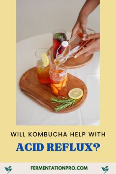 a person is preparing drinks on a tray with the words will kombucha help with acid refluxx?