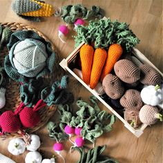 crocheted vegetables and fruits are on the table