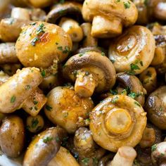 mushrooms with herbs and seasoning in a bowl