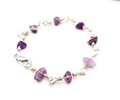 Sterling Silver Amethyst Bracelet Amethyst jewelry has an undeniably calming energy, and this bracelet is no exception! Enjoy the calming vibes with this handmade Amethyst sterling silver bracelet, made with .925 sterling silver and amethyst chip beads! 💜 Your Amethyst sterling silver bracelet will be made to order just for you, so there will be variations in the amethyst crystals from the stock photos. Standard size is 8 inches, but if you need a different size please leave a note at checkout. Purple Bohemian Everyday Jewelry, Spiritual Sterling Silver Bracelets With Natural Stones, Sterling Silver Spiritual Bracelets With Natural Stones, Purple Bracelets With Natural Stones, Everyday Purple Bracelets With Natural Stones, Handmade Purple Sterling Silver Beaded Bracelets, Bohemian Purple Nickel-free Bracelet, Sterling Silver Bracelets With Natural Stones For Healing, Bohemian Nickel Free Purple Bracelets