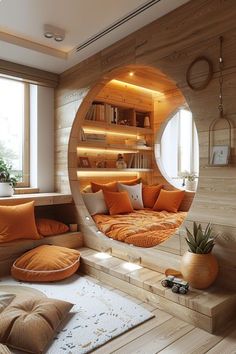 a circular mirror in the middle of a room filled with furniture and pillows on top of wooden flooring