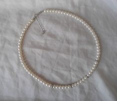 PREFERENTIAL POLICIES : The order is $50 or more.There will be a 10% discount. Please use the coupon code: CZH10 Welcome back to my shop: https://www.etsy.com/shop/pearlandjewelry Description of the product in the picture: The necklace is 18 inches long ,and I make them with 6mm ivory glass pearls,Add any Rhinestone in the necklace ,It is nice for your wedding. If you need the other lengh or size ,Please feel free contact me.Thank you so much, :) I will sent your order in 3-5 business days after Pearl Beaded Rhinestone Necklace Gift, Beaded Pearl Rhinestone Necklace For Gift, White Rhinestone Necklace With Pearl Chain For Gift, White Pearl Rhinestone Necklace For Gifts, Gift White Rhinestone Necklace With Pearl Chain, Ivory Pearl Necklace, Wedding Bridesmaid Jewelry, Pearl Necklace Wedding, Long Pearl Necklaces