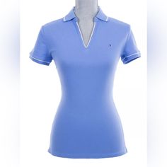 Tommy Hilfiger Women's 100% Cotton Polo Shirt (Low V-Neck And Cap Sleeve) With Signature Micro Tommy Hilfiger Flag On The Chest. Size Small New With Tags Tommy Hilfiger Blue Short Sleeve Tops, Tommy Hilfiger V-neck Tops, Classic Blue Stretch Tops, Fitted Tommy Hilfiger V-neck Tops, Fitted V-neck Tommy Hilfiger Tops, Tommy Hilfiger Fitted V-neck Tops, Blue Fitted Johnny Collar Top, Casual Tommy Hilfiger V-neck Top, Tommy Hilfiger Casual V-neck Top