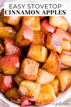 a white bowl filled with cooked potatoes on top of a table