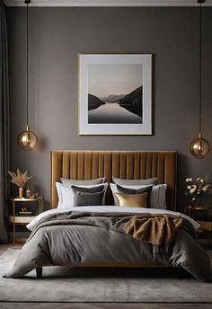 a bedroom with grey walls and gold accents