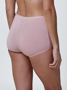 This flattering, full coverage boyshort is perfect to wear under everything. Complete the set with the Reign T-Shirt Bra. Full rear coverage. Sits at the waist. Wide sides won't dig in. Allover soft and stretchy Modal fabric. Flat elastic tunneled at waist for a stay put fit. Picot elastic trim edge at leg. Cotton gusset. Style # 375203 Sizing Info: Karina's hips measure 36" and is wearing a size Small. Stretch Shapewear For Daywear, Solid Fitted No-show Boxer Briefs, Fitted Soft Touch Boxer Briefs, Daywear Short Length Stretch Shapewear, Supportive Seamless Bottoms For Daywear, Fitted Seamless No-show Boxer Briefs, Stretch Boxer Briefs With Contoured Waistband, Seamless Fitted Boxer Briefs, Seamless Fitted No-show Boxer Briefs