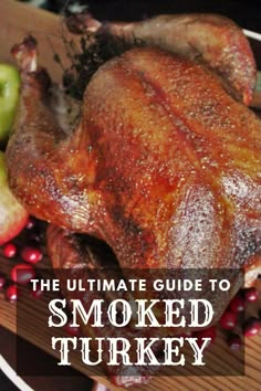 the ultimate guide to smoked turkey on a plate with cranberries, apples and cinnamon