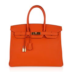 Hermes Birkin 35 bag featured in Feu Orange - a fresh take on the the iconic classic.Rich with gold hardware.Hermes leather in Togo is textured to be scratch resistant.This classic orange Birkin bag is the perfect addition to any Hermes handbag collection.Comes with lock, keys, clochette, sleeper, raincoat and signature Hermes box.NEW or NEVER Unparalleled for 21 years in trust, integrity and service, mightychic offers a beautiful selection of Hermes at your fingertips.final sale BAG MEASURES:LENGTH 35cm / 14" TALL 28cm / 11"DEEP 18cm / 7" HANDLES:TALL 5"CONDITION:NEW or NEVER PLEASE NOTE: Hermes bag payments require bank wire transfer unless arrangements are made prior to purchase Will be delivered with Box, dust bag, card, booklet and receipt Exchange Accepted in this cases :/p> Orange Birkin, Rare Hermes Birkin, Hermes Leather, Hermes Birkin 35, Handbag Collection, Hermes Handbags, Hermes Bag, Hermes Birkin, Birkin Bag