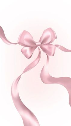 a pink ribbon with a large bow on it's end is blowing in the wind