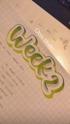 an open notebook with the word wedder written in cursive writing on it