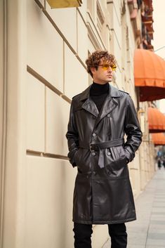 Elevate your wardrobe with our stunning Leather Trench Coat, perfect for any stylish occasion. This Long Leather Jacket combines elegance and comfort, making it an essential Mens Leather Coat. Our Black Leather Jacket/Leather Overcoat is crafted from genuine lambskin leather, ensuring a luxurious feel. Whether you're searching for the ideal Trench Coat For Men or a thoughtful Christmas Gift, you'll find the perfect choice here. Treat yourself or surprise someone special with a timeless luxury outwear!  Material: 100% Lambskin Leather Front Closure: Button & Belt Color: Black Leather Jacket Men Our collection features a variety of stylish options, making it the perfect Gift For Him this holiday season. If you're searching for a thoughtful Gift For Men, look no further than our luxurious lea Classic Long Leather Jacket For Formal Occasions, Elegant Leather Jacket For Fall, Designer Leather Jacket For Winter Business, Designer Leather Jacket For Business In Winter, Designer Leather Jacket For Formal Winter Occasions, Elegant Single Breasted Long Leather Jacket, Elegant Leather Jacket For Business In Winter, Elegant Long Single Breasted Leather Jacket, Elegant Long Coat Leather Jacket For Winter