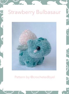 a crocheted stuffed animal with an egg on it's back and the words strawberry bulbasaur written below