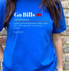 "Introducing our Gildan Soft Style Unisex \"Go Bills\" Definition T-Shirt - a must-have for devoted Buffalo Bills football fans! This tee is not just clothing; it's a proclamation of your passion for the Bills and an ideal gift, especially during the festive season. 🏈 Key Features: ✨ Premium Quality: Enjoy the soft and comfortable feel of the Gildan Soft Style Unisex T-Shirt. 👏 Team Spirit: Proudly shout \"Go Bills\" with this shirt celebrating the iconic Buffalo Bills. 🎨 Unique Design: The \ Funny Buffalo Bills Shirts, Buffalo Bills Apparel, Go Bills, Buffalo Bills Gear, Buffalo Bills Shirt, Definition Design, Bills Shirts, Bills Mafia, Buffalo Football