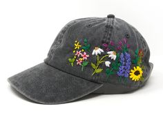 This hand embroidered flower baseball cap is a one-of-a-kind accessory that combines style and comfort. The cap is crafted from high-quality material, ensuring durability and comfort. The intricate floral design is hand-embroidered, giving each cap a unique touch and making it a standout piece. Whether you're running errands or enjoying a day outdoors, this cap will keep the sun out of your eyes in style. Flower is 100% hand embroidered on a 100% cotton wash black baseball cap. Hat is one size fits all with adjustable back strap. Unique cap, one of a kind! I am also open for customization. If you want the item in different colors, please message me, it will take additional 2-3 days of handling time. Free first class shipping, upgradable priority mail service. 30 days return policy, feel co Multicolor Curved Brim Baseball Cap For Spring, Custom Embroidered Hats For Spring, Custom Embroidered Hats For Spring, One Size Fits Most, Multicolor Curved Bill Hats For Spring, Adjustable Multicolor Baseball Cap For Spring, Spring Snapback Hat With Embroidered Patch, Spring Embroidered Baseball Cap, Multicolor Curved Bill Baseball Cap For Spring, Spring Hats With Embroidered Patch, One Size Fits Most