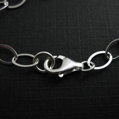 Material: 925 Sterling silver made in Italy. Size: 22 inches The chain size is about 8.5mm long, 6mm wide. Quantity: 1 piece. Model: 601010 For all available lengths of this chain, click here: https://www.etsy.com/listing/96418048 This necklace chain is also available in: Oxidized sterling silver: https://www.etsy.com/listing/485979788 Please convo me for large quantity. Pictures show the shape of the chain, for actual size please read the measurement. ------------------------------------------- Silver Oval Cable Chain Jewelry, Oval Silver Jewelry With Cable Chain, Oval Sterling Silver Chain Necklace, Silver Oval Jewelry With Lobster Clasp, Elegant Sterling Silver Oval Chain Necklace, Oval Sterling Silver Chain Necklace With Adjustable Chain, Silver Oval Chain Necklace, Chunky Silver Bracelet, Extra Long Necklace