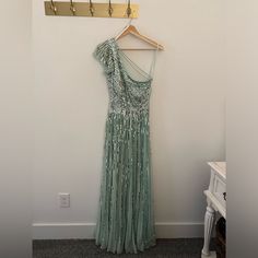 Beautiful Gown, Worn To My Sister’s Spring Wedding. Compliments All Night Long! Altered Slightly For Length, See Photos For Measurements. Slight Sequin Damage Towards The Bottom Of The Dress, Also Referenced In Photo. Still In Great Condition. Retails For $598 + Tax Green Embellished Cocktail Gown, Mac Duggal Dresses, Sleeve Gown, Mac Duggal, Gowns With Sleeves, Beautiful Gowns, My Sister, Spring Wedding, Pistachio