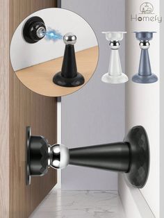 an open door with three different knobs on the handle and one has a blue light coming from it