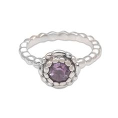 A polished beaded band hosts a pretty blossom in this ring from Bali's Wayan Lasti. The crown features a sparkling round amethyst set within layers of silver petals. Artisans craft the ring by hand from sterling silver. Silver Amethyst Birthstone Ring With Round Stone, Silver Amethyst Birthstone Ring, Elegant Stackable Adjustable Amethyst Ring, Adjustable Amethyst Ring With Accent Stones, Silver Amethyst Rings With Faceted Detail, Silver Amethyst Stackable Promise Ring, Silver Stackable Amethyst Promise Ring, Elegant Silver Stackable Amethyst Ring, Silver Amethyst Stackable Jewelry