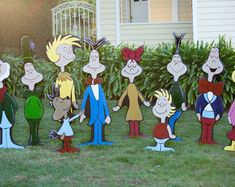 a group of cartoon characters standing in front of a house