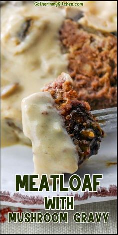 meatloaf with mushroom gravy is on a plate and has a fork in it