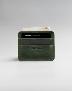 "The credit holder is made of genuine leather. The combination of materials creates a beautiful card case that will last for years and is a pleasure to touch every day. DESIGN: Available in five colors: Gray Ginger Brown Green Black MEASUREMENT: 3.1\" x 4.3\" (8.7cm x 11cm) HOW IS IT DONE? 100% handmade from selected leather." Green Trifold Wallet With Card Slots As Gift, Green Trifold Wallet With Interior Card Slots As Gift, Green Wallets With Card Slots As A Gift, Green Wallets With Card Slots For Gift, Casual Trifold Wallet With Card Slots As Gift, Green Rectangular Card Holder For Daily Use, Green Rfid Blocking Card Holder For Everyday, Green Rectangular Trifold Wallet, Green Rectangular Wallets With Card Slots