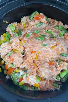 the food in the bowl is prepared and ready to be put into the crock pot