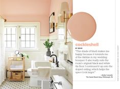 a bathroom with pink walls and white fixtures