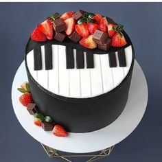 a cake with chocolate and strawberries on top